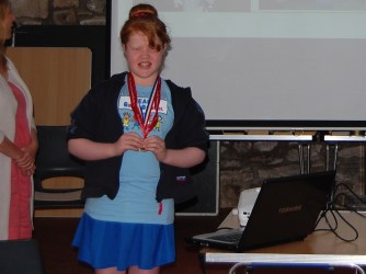 Joanna Nankervis shows off her Transplant Games medal  as she talks to us about her experience  as a kidney transplant recipient.