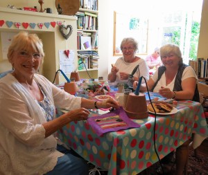 Colleen Lewis, Val Puddiphatt and Kathy Merrett enjoy their work