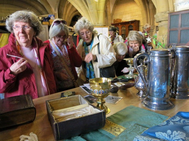Hilda, Sue and Di examine some of the Cathedral's treasures