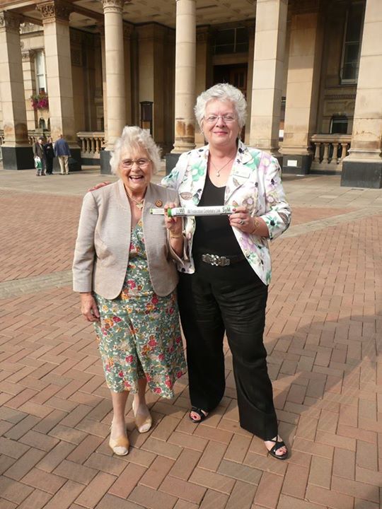 Here Warwickshire Federation Chairman Jeryl Stone is passed the baton from the West Midlands Federation.