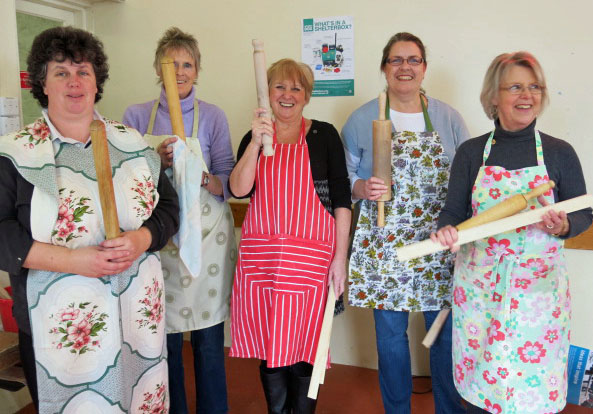 Sue, Liz, Margie, Alison and Lis wield their rolling pins 